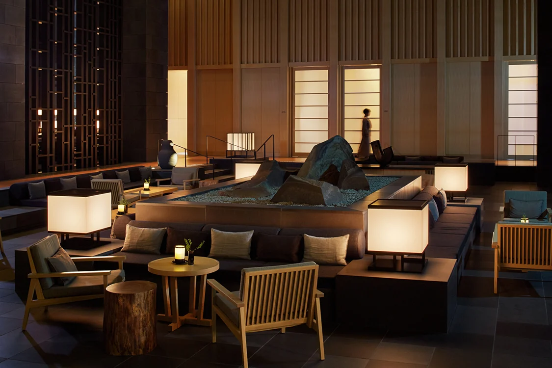 Open, gallery-like lobby of Aman Tokyo with high ceilings
