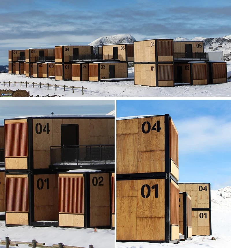 Shipping container hotel rooms with large windows and private terraces
