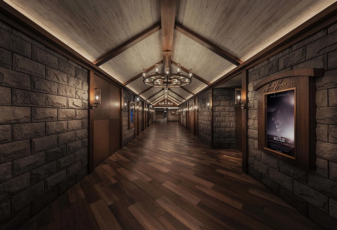 Dark wood and stone details in the K11 Art House cinema