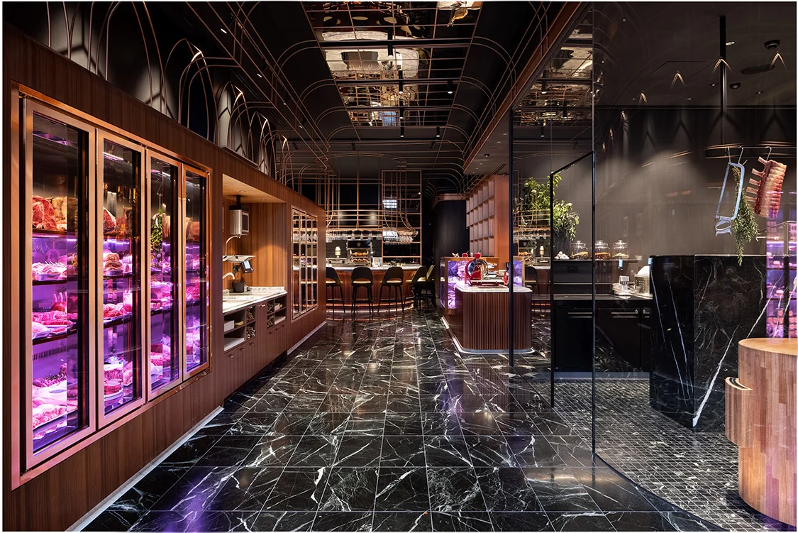 Dramatic lighting and dark tones inside the Melbourne butcher shop