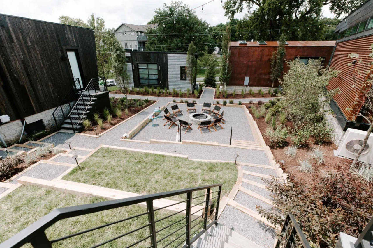 Courtyard and fire pit surrounded by the tiny home hotel rooms