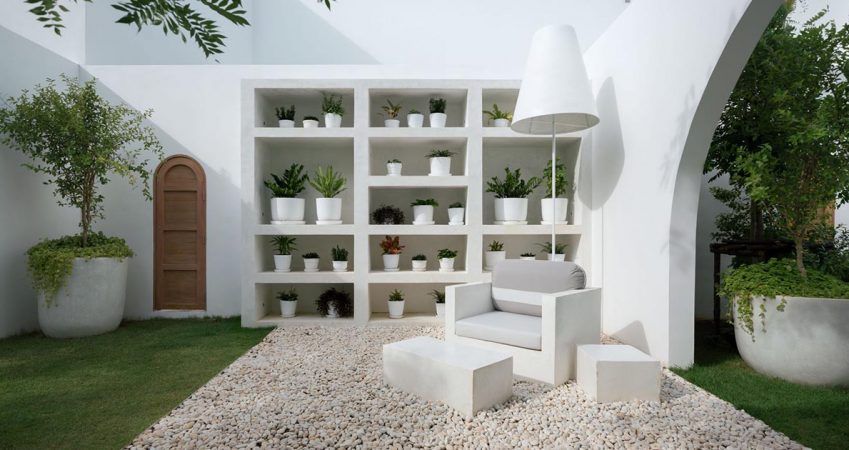 this-landscaped-outdoor-space-includes-a-living-room-with-a-bookshelf-for-plants