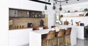 this-kitchen-island-was-designed-to-also-be-a-casual-dining-table-with-seating-on-both-sides