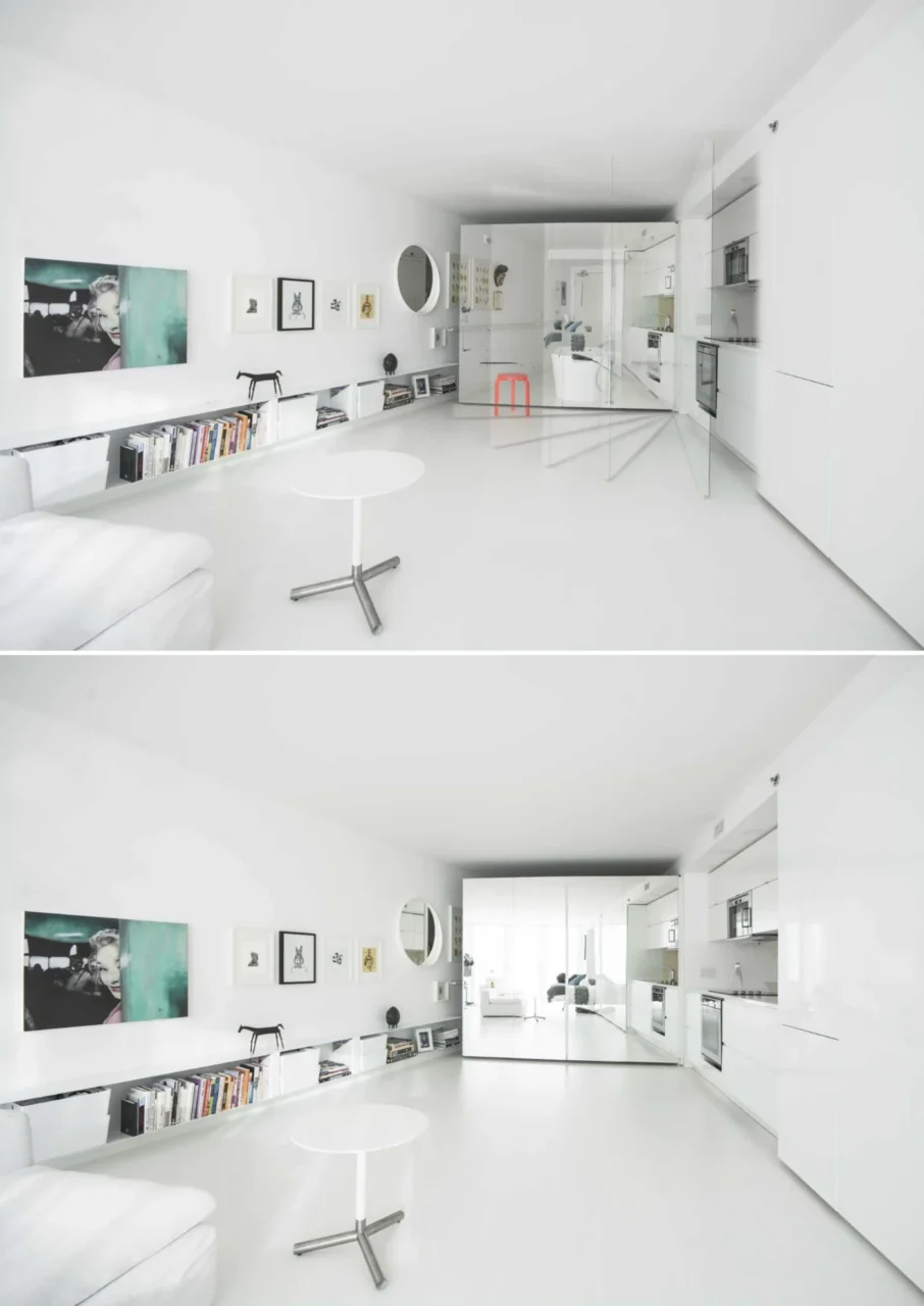 White wedge-shaped apartment with a kitchen concealed in the wall
