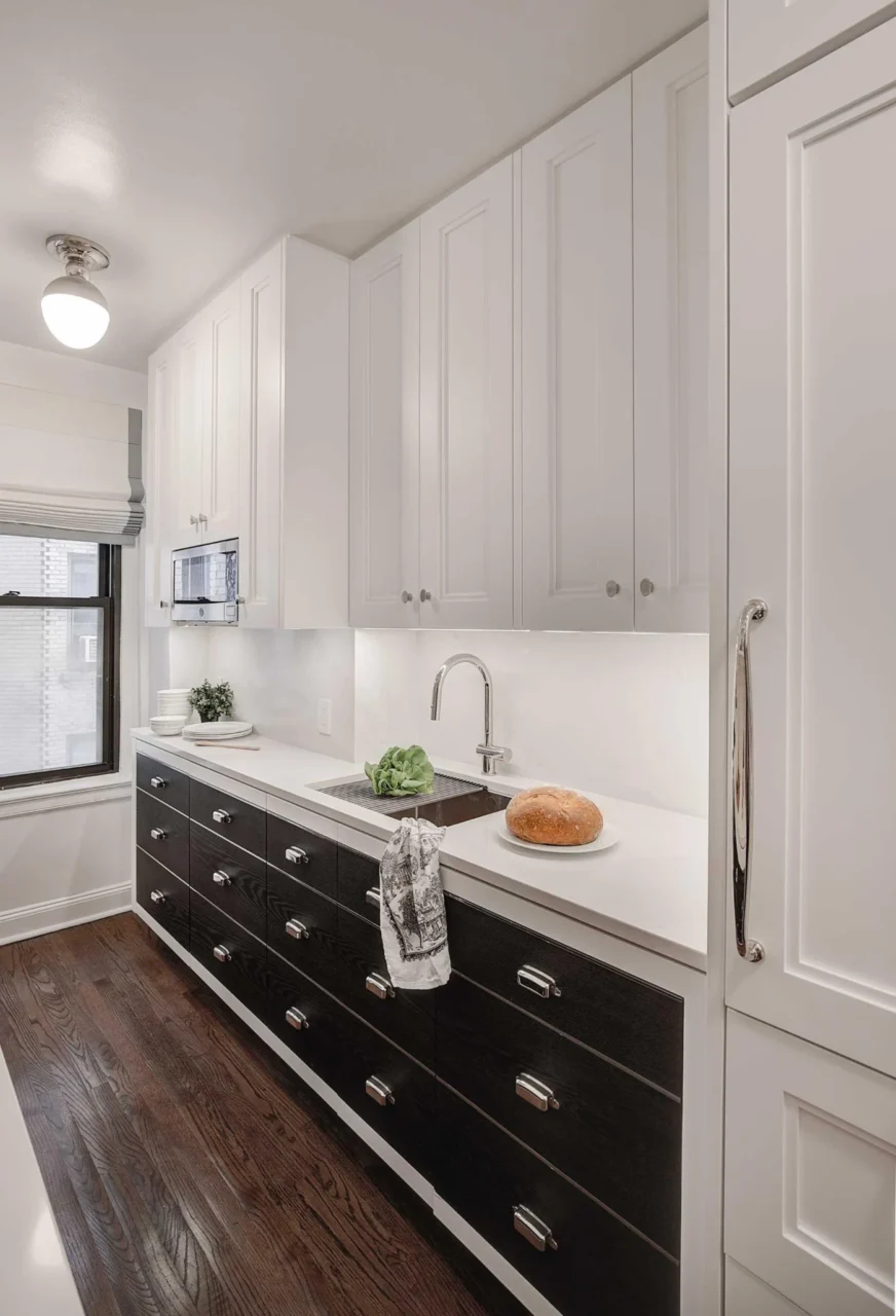 Polished nickel inlays giving cabinet doors the look of drawers