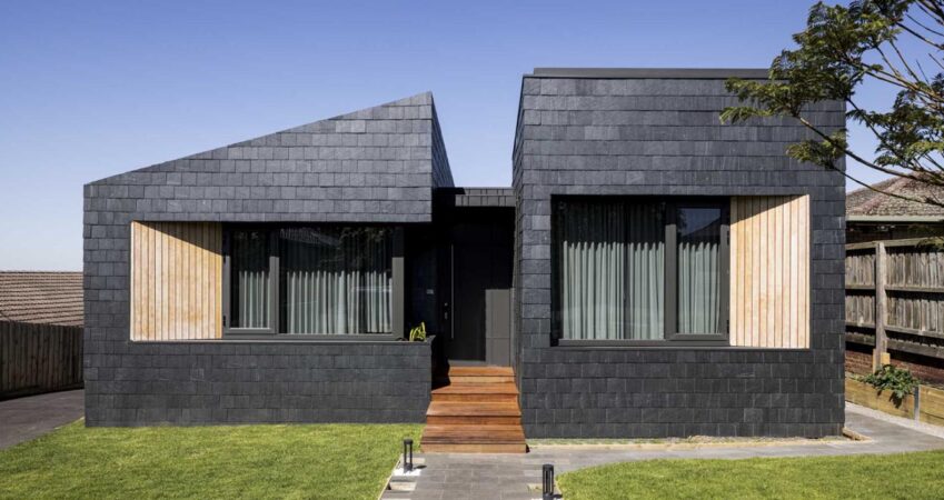 slate-shingles-on-the-exterior-of-this-home-continue-on-to-the-interior