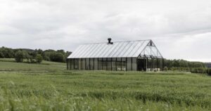 this-glass-house-acts-as-the-entrance-to-a-partially-underground-restaurant