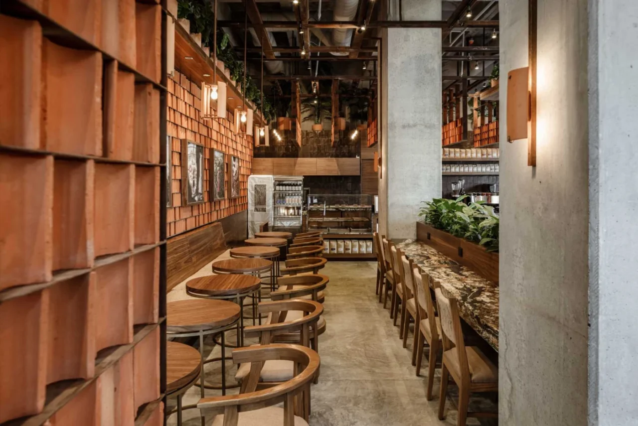Light falling across the textured clay tile walls