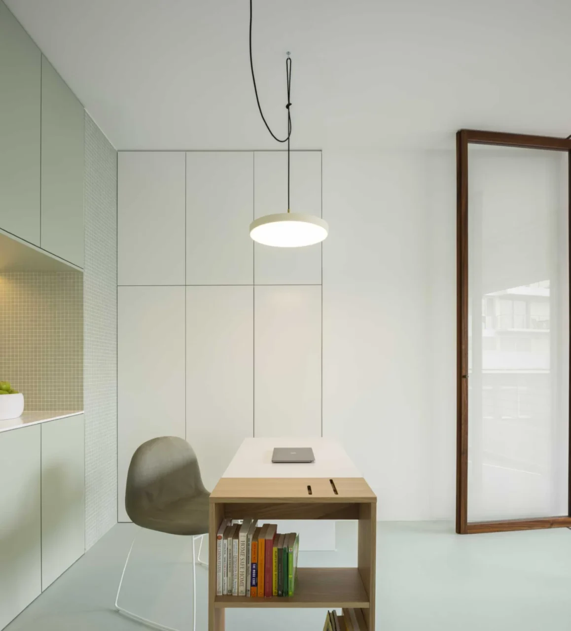 Office in the Think Health clinic with pastel green accents