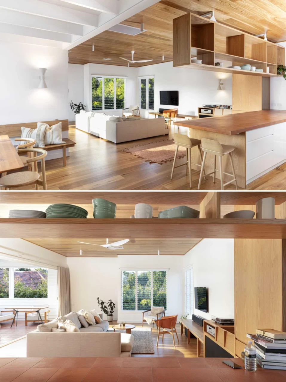 Living room with a wood shelf under the TV that runs into a built-in DJ booth