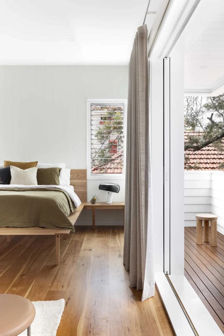 Primary bedroom with its own private balcony