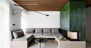 tube-shaped-tiles-surround-the-fireplace-inside-this-home