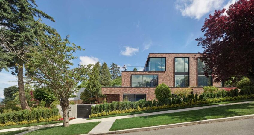 this-modern-brick-house-terraces-down-the-hillside