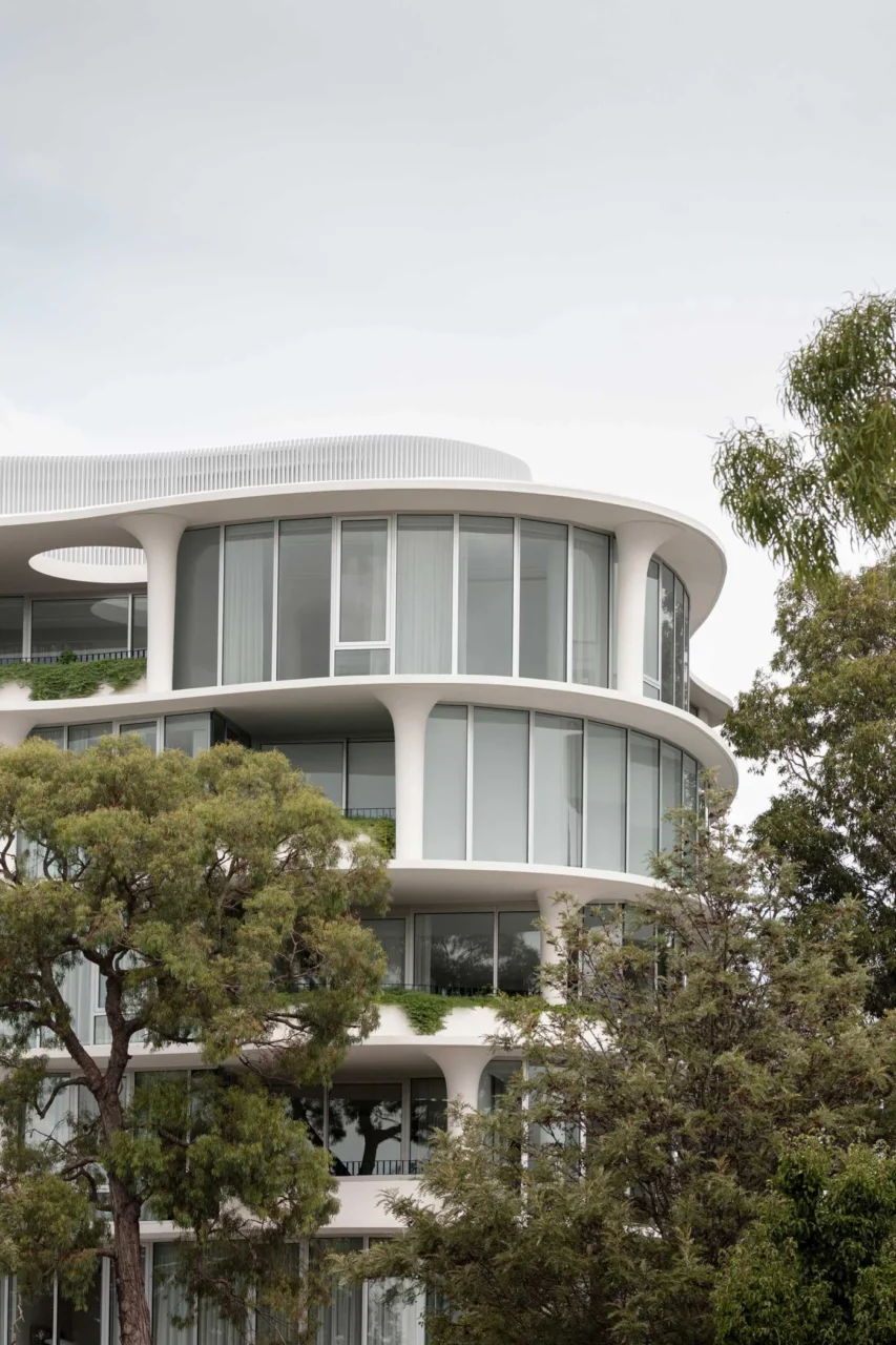 Flared columns shaped into the curved exterior of the building