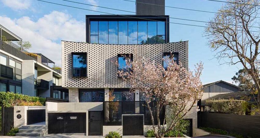 a-curved-brick-facade-presents-a-contemporary-face-for-this-collection-of-townhomes