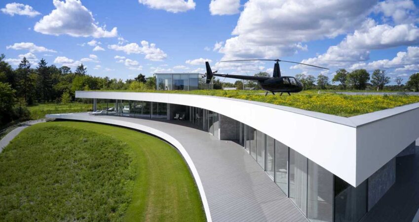 they-land-helicopters-on-the-green-roof-of-this-house