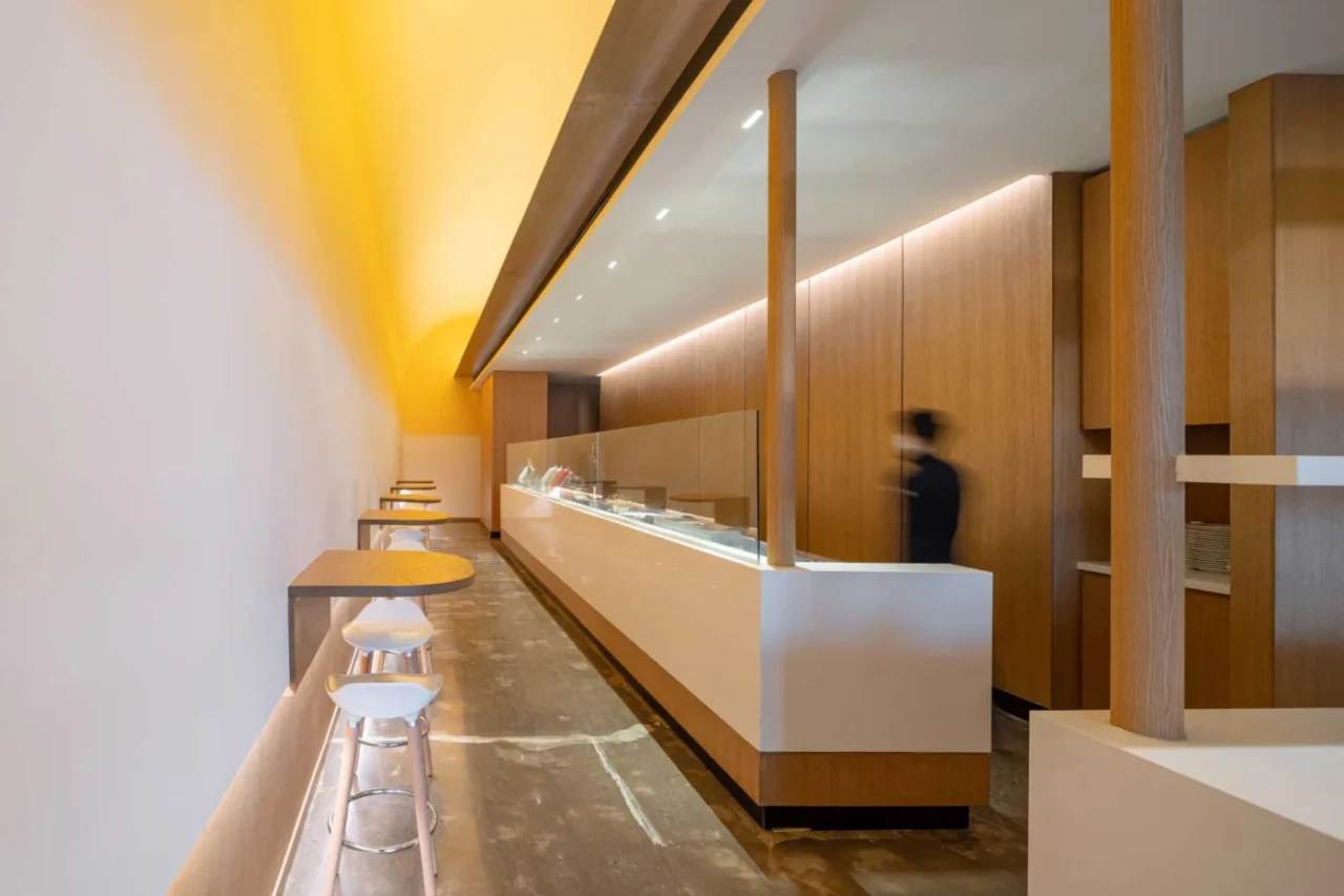 Exposed kitchen and minimalist service counter