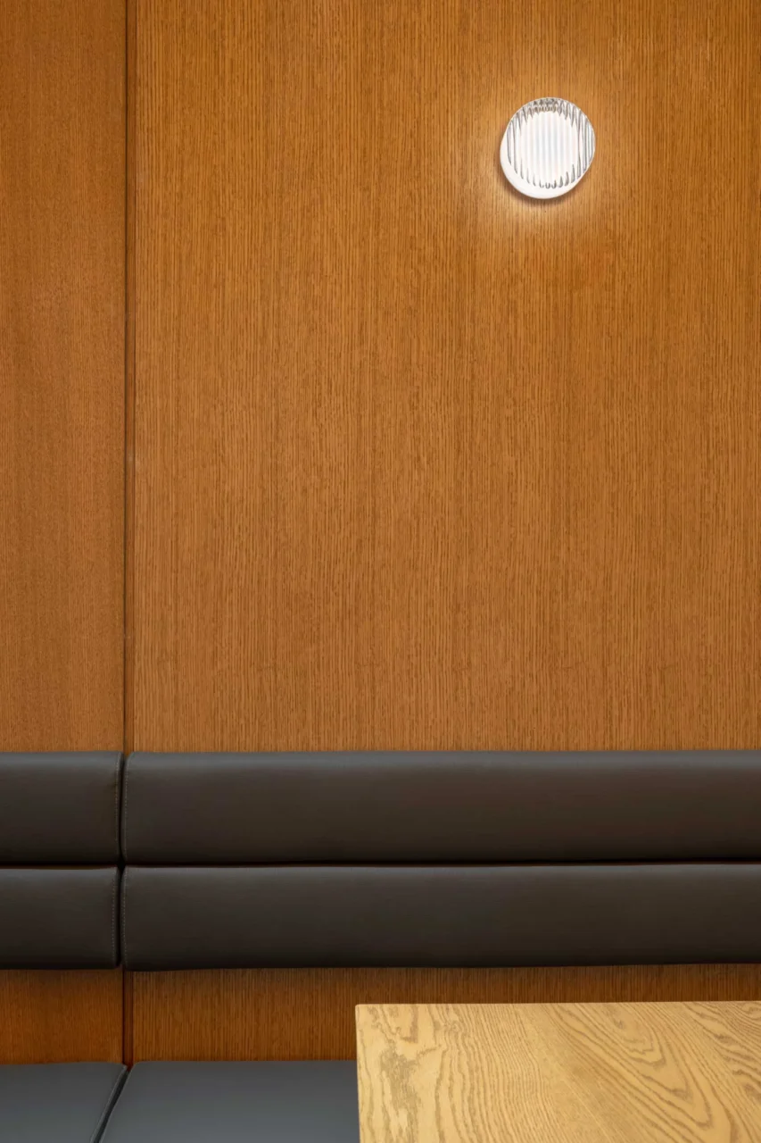 Long banquette seating set into an alcove