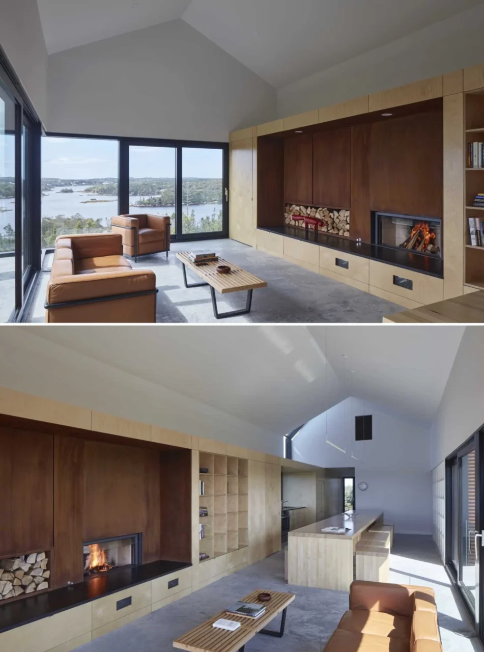 Open-plan living, dining and kitchen with white walls, concrete floor and wood-and-steel cabinetry
