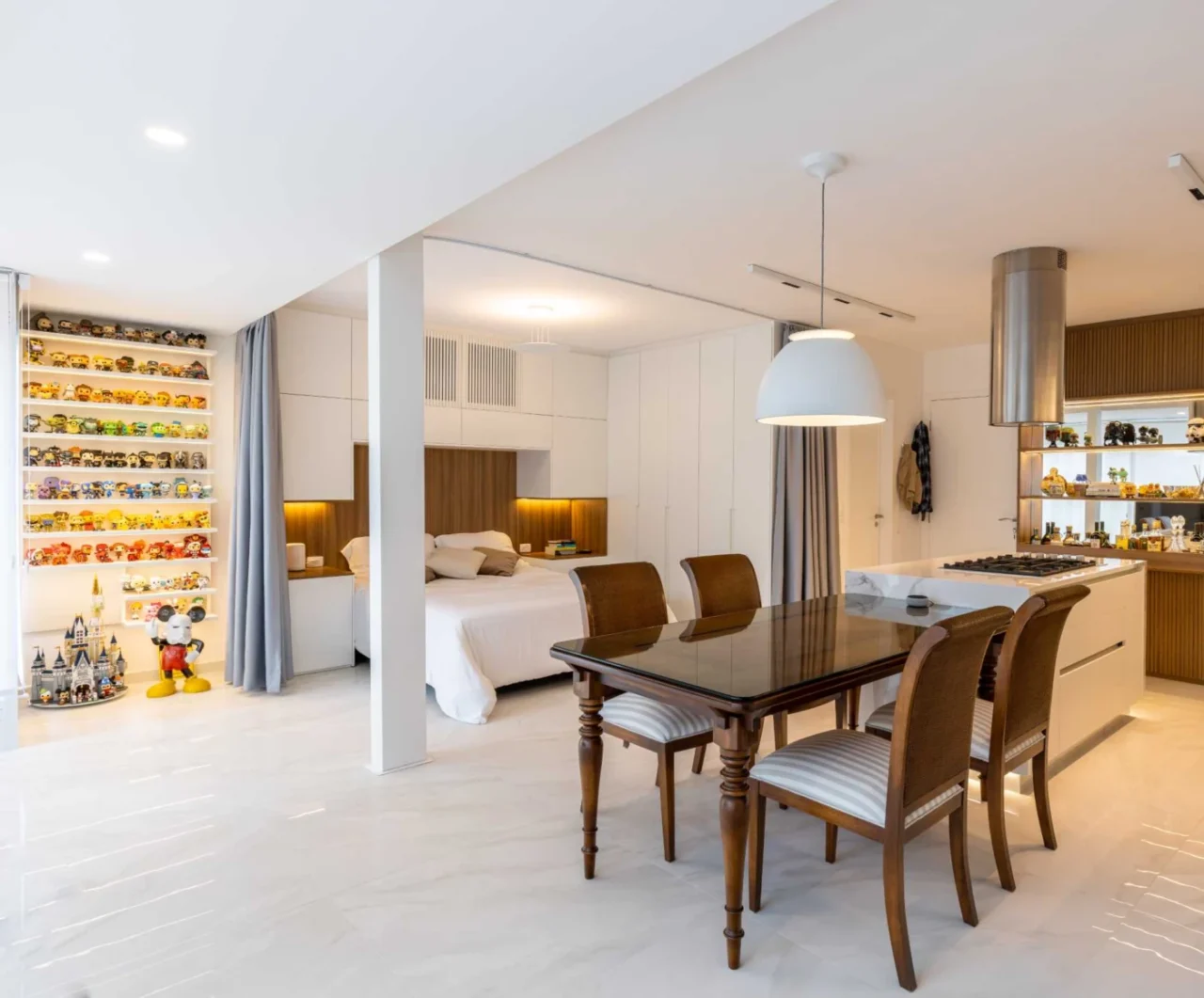 Open-plan apartment with the bedroom beside the living area