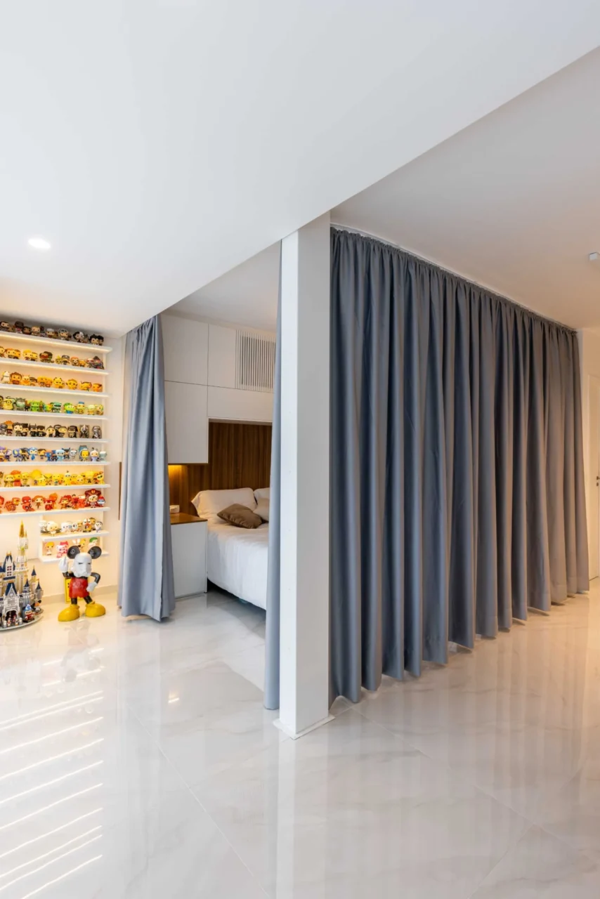Bedroom enclosed by closed curtains