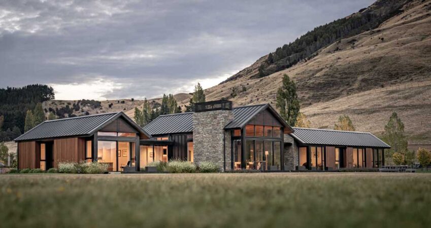 a-material-palette-of-cedar,-stone,-and-metal-contribute-to-the-charm-of-this-farmhouse-inspired-home