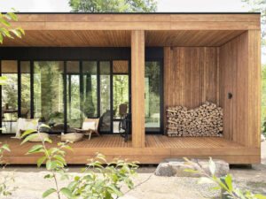 wood-and-glass-frame-the-tree-views-at-this-home-in-the-mountains