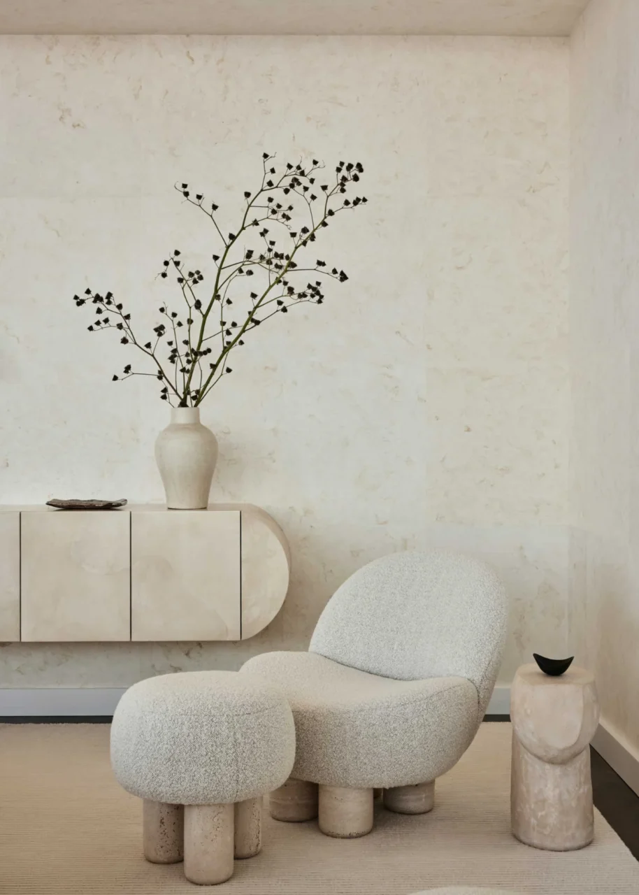 Seating area with contemporary side chairs, tables and a paper lantern
