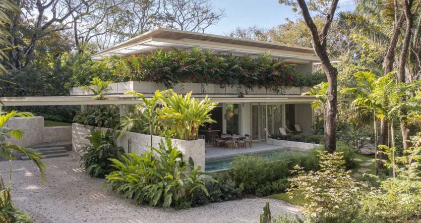 planter-boxes-were-designed-to-help-this-house-to-blend-into-its-tropical-setting