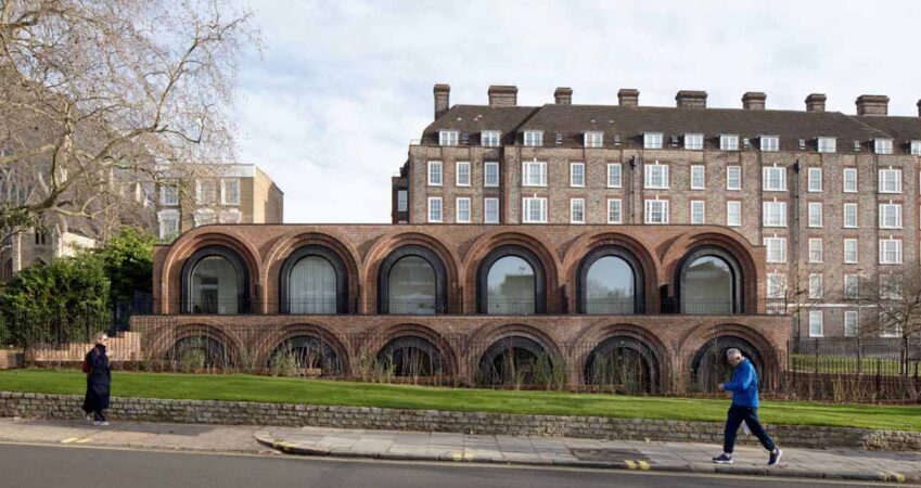 pivoting-arched-windows-are-a-unique-feature-on-this-row-of-townhouses-in-london