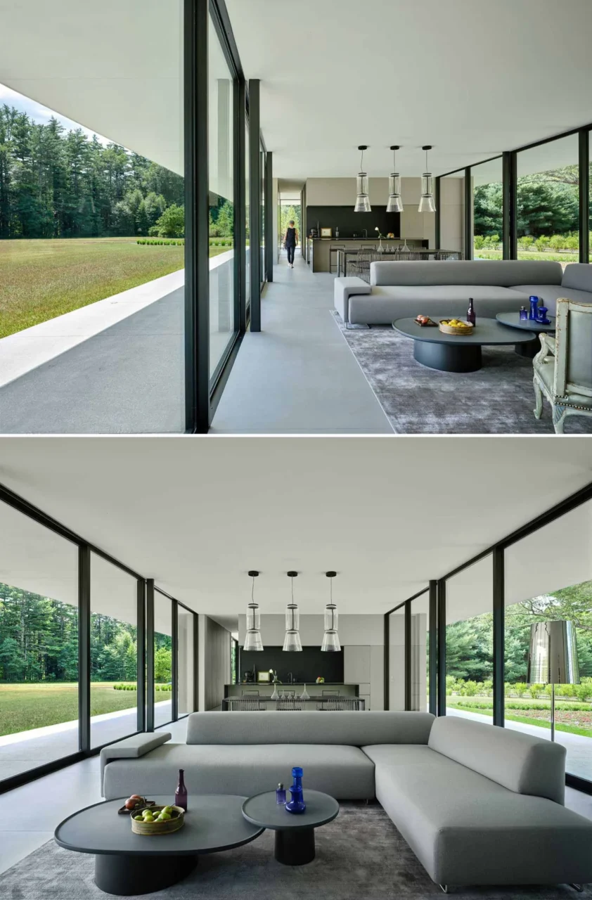 Open living area with floor-to-ceiling glass and large porcelain surfaces