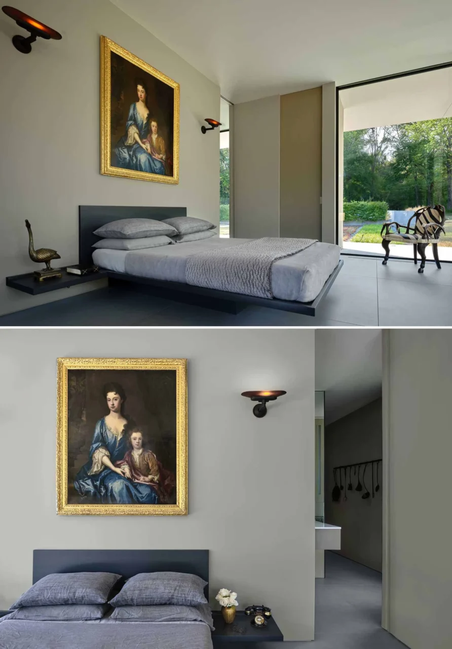 Primary bedroom with a floating bed and art from the owners' collection