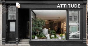 a-large-sliding-window-offers-a-look-inside-this-nature-inspired-store-design