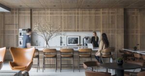 a-plaid-inspired-wood-kitchen-is-a-unique-design-feature-inside-this-office