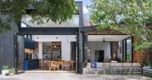bi-fold-windows-connect-the-inside-and-outside-spaces-of-this-home-extension