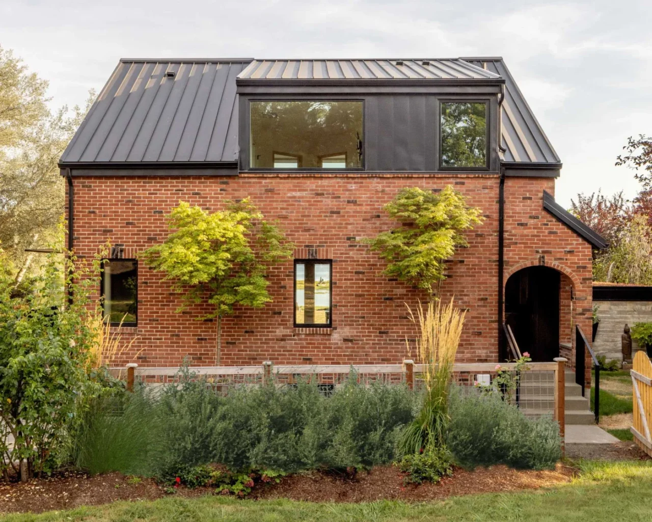 Side entrance and new windows on the updated farmhouse