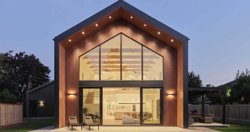 a-vaulted-ceiling-is-a-dramatic-feature-inside-this-modern-barn-house