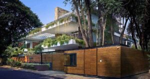 overhanging-plants-surround-the-exterior-of-this-home