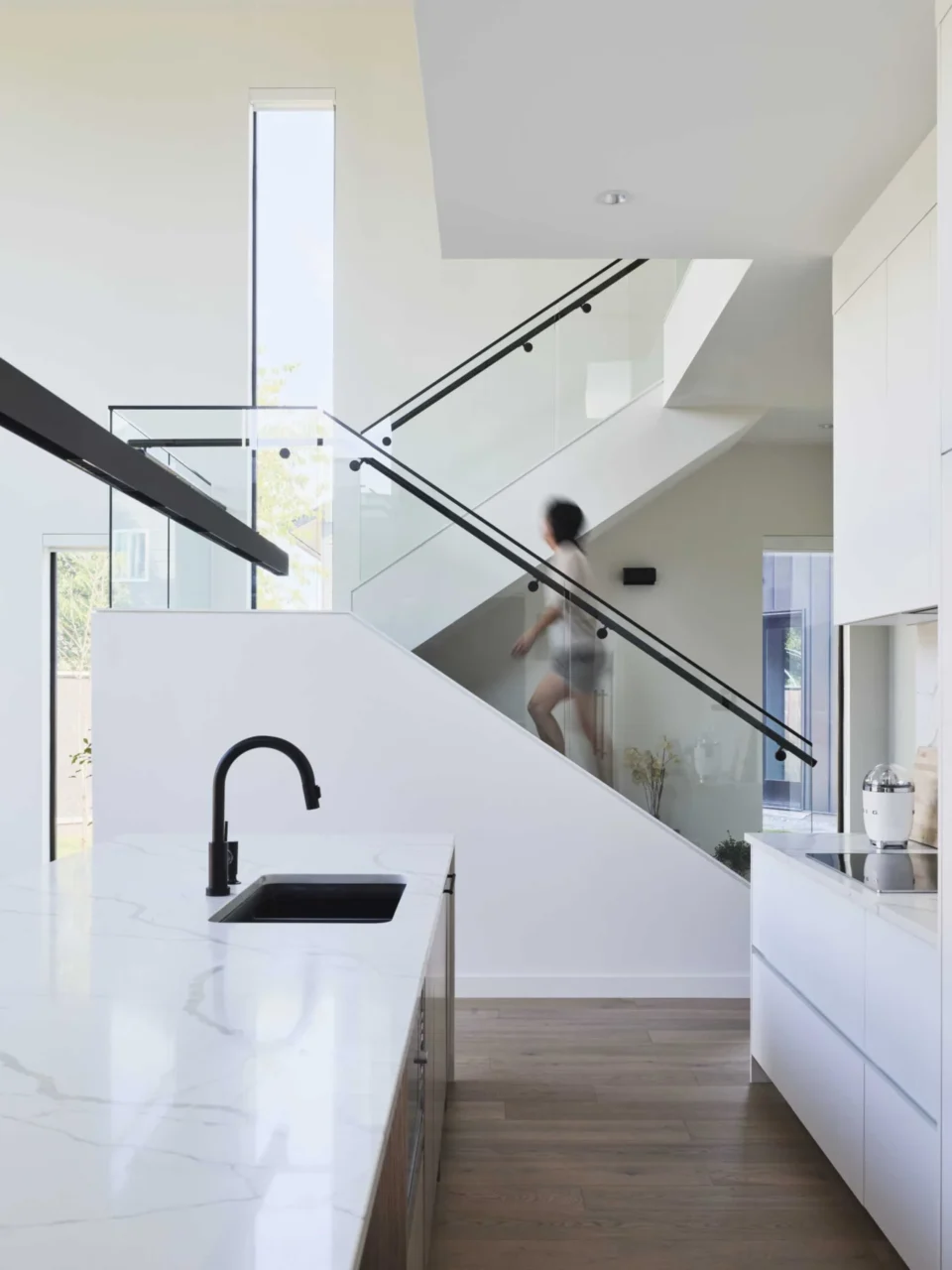 Open staircase leading up to the mezzanine