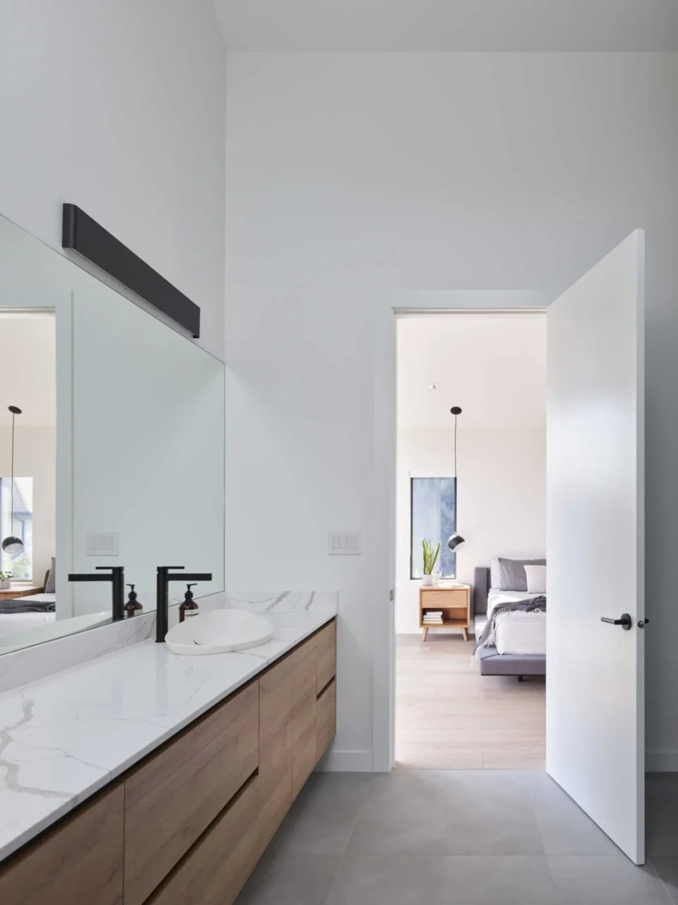En-suite bathroom with double vanity, walk-in shower and freestanding bathtub