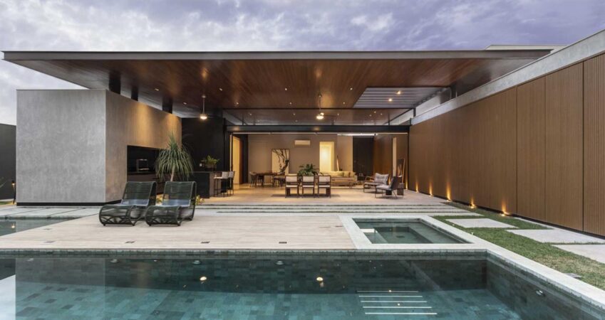 a-large-double-height-ceiling-allows-the-social-areas-of-this-home-to-open-completely-to-the-outside