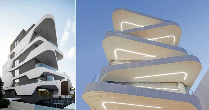 lighting-highlights-the-alternating-curvilinear-balconies-of-this-new-apartment-building