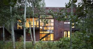 a-rusty-exterior-for-a-home-in-a-rustic-setting