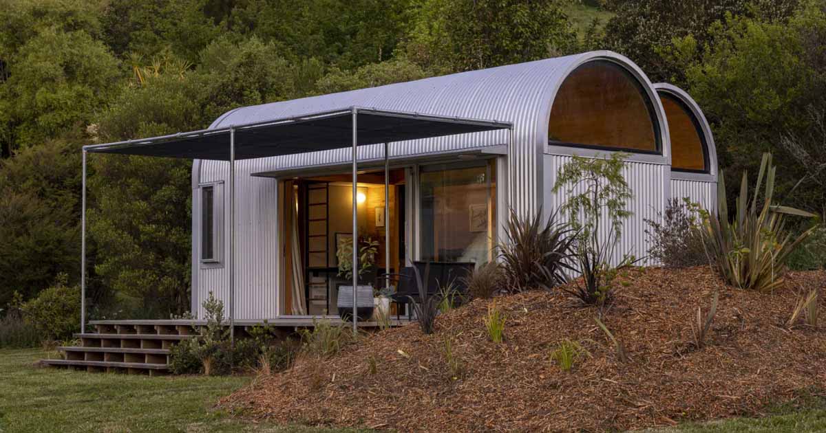 corrugated-metal-covers-the-barrel-shaped-roofs-of-this-portable-home