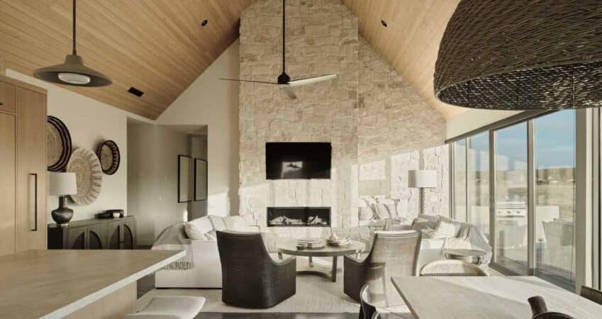 wood-lines-the-length-of-the-gable-vaulted-ceiling-in-this-home