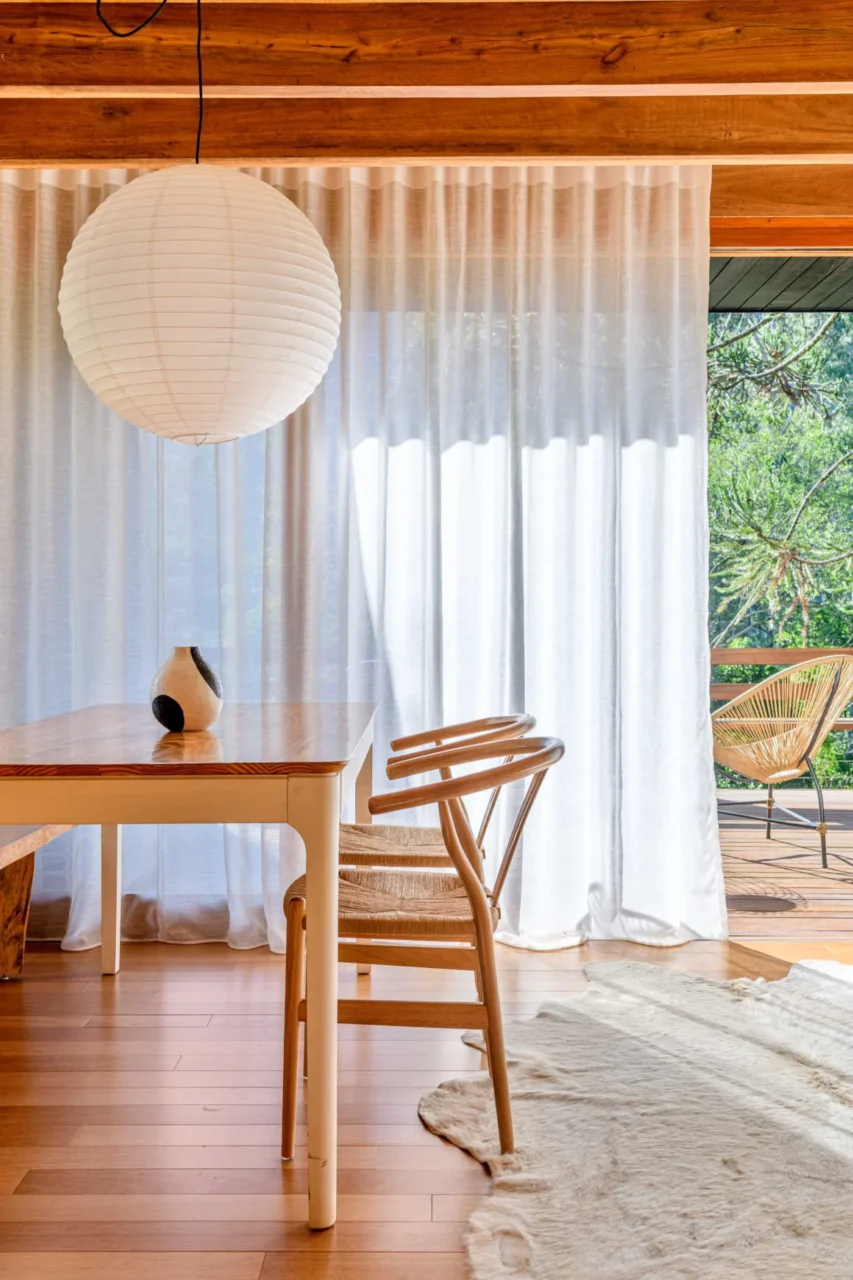 Fireplace and window bench in the plywood-lined tree house