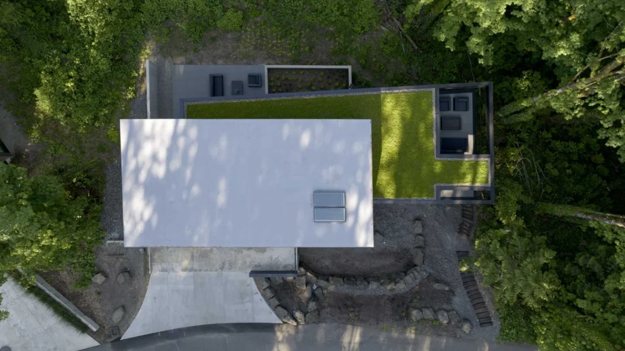 Green roof over the stepped levels of the forest house