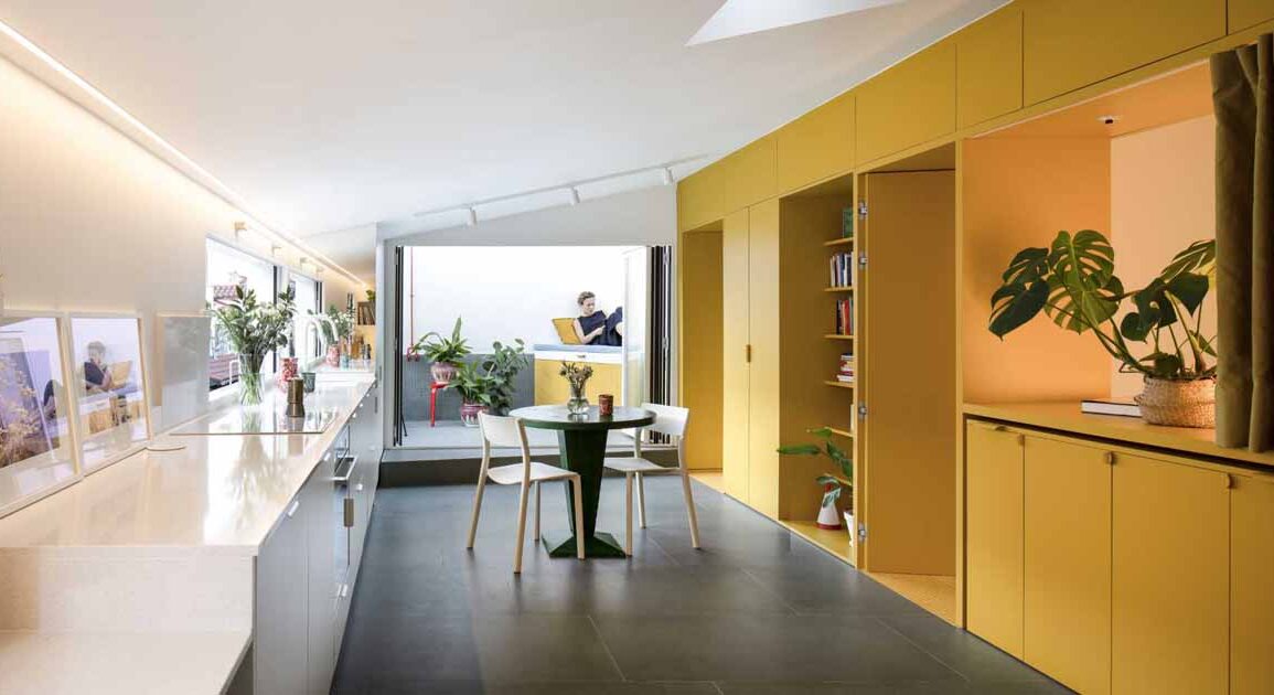 a-home-renovation-where-adding-a-yellow-accent-wall-was-a-bright-idea