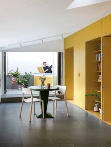 a-home-renovation-where-adding-a-yellow-accent-wall-was-a-bright-idea