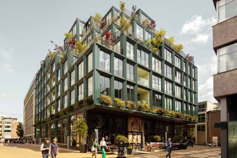 ceramic-forms-surrounding-the-windows-of-this-new-building-give-it-a-unique-character